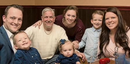 This photo provided by the family shows from left, David Bennett Jr., Preston Bennett, David Bennett Sr., Gillian Bennett, Nicole (Bennett) McCray, Sawyer Bennett, Kristi Bennett in 2019. In a medical first, doctors transplanted a pig heart into Bennett Sr., in a last-ditch effort to save his life and the hospital said Monday, Jan. 10, 2022 that he's doing well three days after the highly experimental surgery. (Byron Dillard via AP)