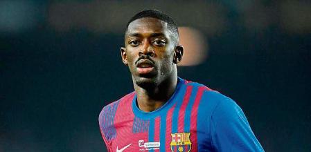 (FILES) In this file photo taken on December 18, 2021 Barcelona's French forward Ousmane Dembele runs on the pitch during the Spanish league football match between FC Barcelona and Elche CF at the Camp Nou stadium in Barcelona. - Barcelona striker Ousmane Dembele, defender Samuel Umtiti and midfielder Gavi have tested positive for Covid-19, the Spanish club said on December 29, 2021, bringing to six the number of infected first team players. The three players join left-back Jordi Alba, centre-back Clement Lenglent and defender Dani Alves who also tested positive this week. (Photo by Pau BARRENA / AFP)