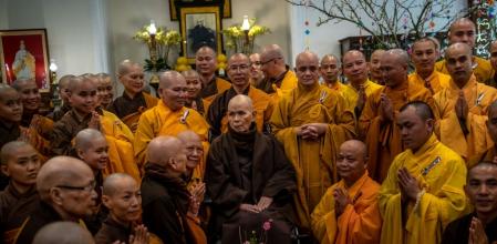 HUE, VIETNAM - JANUARY 25: Buddhist monks and nuns greet zen master Thich Nhat Hanh (center) at a praying ceremony marking the first day of Lunar New Year at Tu Hieu temple on January 25, 2020 in Hue, Vietnam. As one of the most important figures in the fields of mindfulness, meditation and Zen Buddhism, the 93-year-old Vietnamese Buddhist monk Thich Nhat Hanh has had a major influence around the world. His human rights and reconciliation work during the Vietnam War led Martin Luther King Jr. to nominate him for a Nobel Prize. He is now back in the temple where he took his vows at 16, after 40 years of exile, to live his final days. The Lunar New Year also known as the Spring Festival, which is based on the Lunisolar Chinese calendar, falls on January 25 this year and marks the Year of the Rat. (Photo by Linh Pham/Getty Images