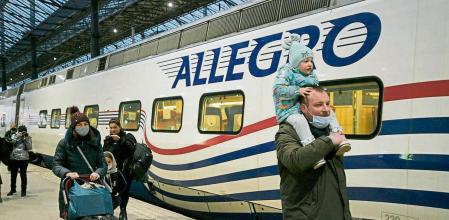 People get off the Allegro train that arrived from St. Petersburg, Russia, to the central railway station in Helsinki, Finland, Friday, March 4, 2022. Russia's war on Ukraine is now in its ninth day and Russian forces have shelled Europe's largest nuclear power plant, sparking a fire there that was extinguished overnight. (Markku Ulander/Lehtikuva via AP)