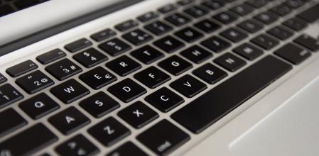 laptop's keyboard  view from the left oblique front side · left center part of the focused keyboard