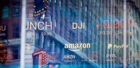 Monitors display stock market information at the Nasdaq MarketSite in New York, U.S., on Friday, Jan. 21, 2022. With the worst start of a year in more than a decade and a $2.2 trillion wipeout in market value, the Nasdaq Composite Index couldn#{emoji}146;t have had a messier kickoff to 2022. Photographer: Michael Nagle/Bloomberg