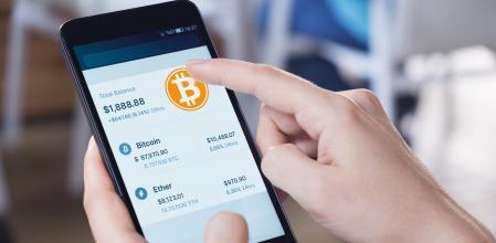 Cartera de moneda criptográfica en un teléfono móvil