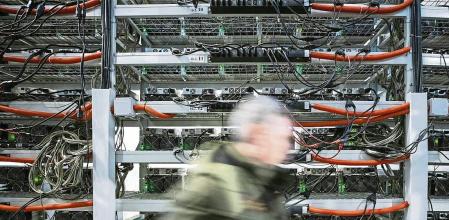 FILE PHOTO: A view shows equipment at the data centre of BitRiver company providing services for cryptocurrency mining in the city of Bratsk in Irkutsk Region, Russia March 2, 2021. REUTERS/Maxim Shemetov/File Photo