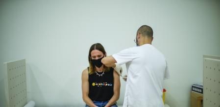 FILE - Daniel Rofin, 41, receives a vaccine against Monkeypox from a health professional in medical center in Barcelona, Spain, Tuesday, July 26, 2022. Public health officials warn that moves by rich countries to buy large quantities of monkeypox vaccine, while declining to share doses with Africa, could leave millions of people unprotected against a more dangerous version of the disease and risk continued spillovers of the virus into humans. (AP Photo/Francisco Seco, File)