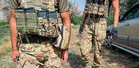 Members of Ukrainian resistance movement return to their base after a drone mission in Mykolaiv region on August 24, 2022, amid Russian invasion of Ukraine. (Photo by Daniel DE CARTERET / AFP)