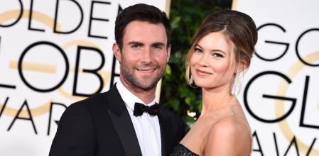 Singer Adam Levine and model Behati Prinsloo attending the 72nd annual Golden Globe Awards on Sunday, Jan. 11, 2015, in Beverly Hills, Calif.
