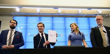 From left: Jimmie Åkesson, leader of the Sweden Democrats Party, Ulf Kristersson, leader of the Moderate Party, Ebba Busch, leader of the Christian Democrats, and Johan Pehrson, leader of the Liberal Party, attend a press conference regarding the formation of the government, at the Parliament in Stockholm, Sweden, Friday Oct. 14, 2022. (Jonas Ekströmer/TT News Agency via AP)