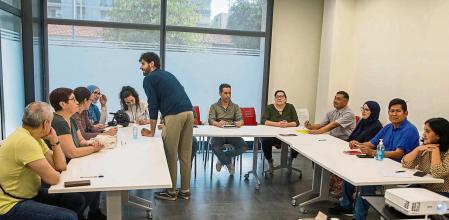Caritas sesión de acompañamiento para la inserción laboral de Cáritas en los locales de la calle Ardevol 5 de Barcelona.