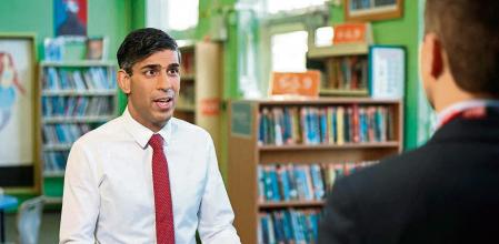 Britain's Prime Minister Rishi Sunak speaks during a televion media interview during his visit to Harris Academy secondary school in south west London on January 6, 2023. (Photo by HENRY NICHOLLS / POOL / AFP)
