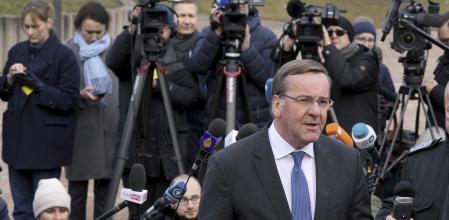 German Defence Minister Boris Pistorius, front, leaves after a press conference during the meeting of the 'Ukraine Defense Contact Group' at Ramstein Air Base in Ramstein, Germany, Friday, Jan. 20, 2023. Defense leaders are gathering at Ramstein Air Base in Germany Friday to hammer out future military aid to Ukraine, amid ongoing dissent over who will provide the battle tanks that Ukrainian leaders say they desperately need. (AP Photo/Michael Probst)