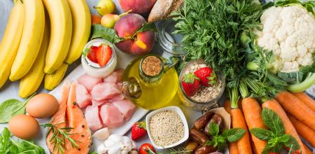 Balanced nutrition concept for DASH clean eating flexitarian mediterranean diet to stop hypertension and low blood pressure. Assortment of healthy food ingredients for cooking on a kitchen table.