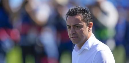 Barcelona's head coach Xavi Hernandez attends the Spanish La Liga soccer match between Getafe and FC Barcelona at the Coliseum Alfonso Perez stadium in Getafe, Spain, Sunday, April 16, 2023. (AP Photo/Manu Fernandez)