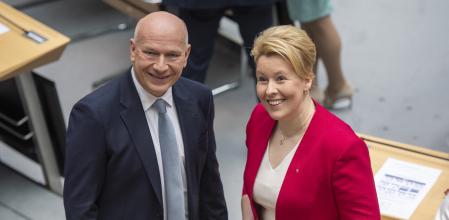 Kai Wegner, designated governing mayor, and Franziska Giffey (SPD), former governing mayor and designated Berlin senator for economics, energy and business, stand together in the plenary hall of the Berlin House of Representatives in Berlin, Germany, April 27, 2023. Berlin's first conservative mayor in 22 years took office on Thursday following a state election in which he capitalized on discontent in the German capital. (Christophe Gateau/dpa via AP)