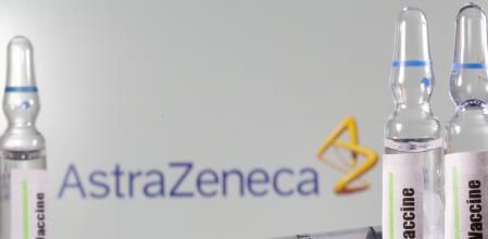 FILE PHOTO: A test tube labelled vaccine is seen in front of AstraZeneca logo in this illustration taken, September 9, 2020. REUTERS/Dado Ruvic/Illustration/File Photo/File Photo