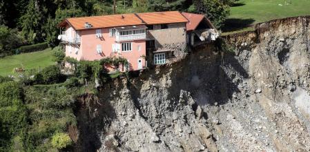 TOPSHOT - This aerial view taken on October 3, 2020 shows the damage in Saint-Martin-Vesubie, southeastern France, after heavy rains and floodings hit the Alpes-Maritimes department. - Heavy rains and brutal floods have left villages cut off from the world in the Alpes Maritimes, where hundreds of fire-fighters have been mobilised on October 3, to find nine missing persons. (Photo by Valery HACHE / AFP)