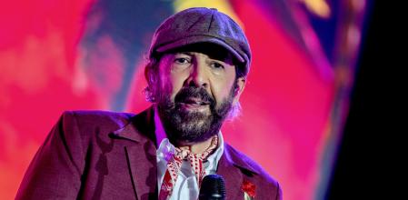 Juan Luís Guerra, en un momento de su actuación en el Palau Sant Jordi