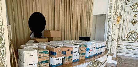 This image, contained in the indictment against former President Donald Trump, shows boxes of records being stored on the stage in the White and Gold Ballroom at Trump's Mar-a-Lago estate in Palm Beach, Fla. Trump is facing 37 felony charges related to the mishandling of classified documents according to an indictment unsealed Friday, June 9, 2023. (Justice Department via AP)