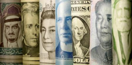 FILE PHOTO: Jordanian Dinar, Yuan, Dollar, Canadian Dollar, Pound and Riyals banknotes are seen in this picture illustration taken June 13, 2017. REUTERS/Dado Ruvic/Illustration/File Photo