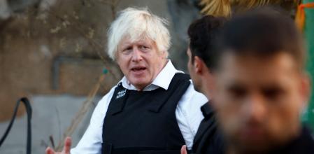 Former British Prime Minister Boris Johnson and former Australian Prime Minister Scott Morrison (not pictured) visit Kibbutz Kfar Aza following the October attack by Hamas gunmen from the Gaza Strip, in southern Israel, November 5, 2023.