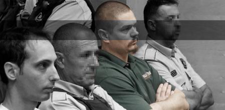 El asesino Dave Verbist, entre dos mossos d'esquadra, durante el juicio en la Audiencia de Girona