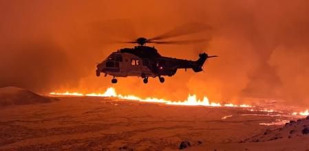 Grindavik (Iceland), 18/12/2023.- A handout photo made available by the Icelandic Coast Guard shows the crew of TF-EIR, a helicopter of the Coast Guard, that flew over a volcanic eruption to estimate its scale after an eruption began, north of Grindavik, on the Reykjanes peninsula, in Iceland, late 18 December 2023, (issued 19 December 2023). An evacuation order for the population of Grindavik was issued early this year on 10 November 2023 following seismic activity and indications of considerable magma movement in the area. (erupción volcánica, Islandia) EFE/EPA/ICELANDIC COAST GUARD / HANDOUT BEST QUALITY AVAILABLE HANDOUT EDITORIAL USE ONLY/NO SALES HANDOUT EDITORIAL USE ONLY/NO SALES