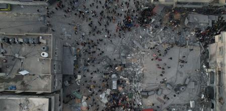 Buildings destroyed by an Israeli airstrike near the Kuwaiti hospital in Rafah, southern Gaza, on Wednesday, Dec. 20, 2023. UK Foreign SecretaryDavid Cameroncalled for a pause in fighting between Israel andHamason Thursday in order to allow hostages out and aid to be brought in. Photographer: Ahmad Salem/Bloomberg