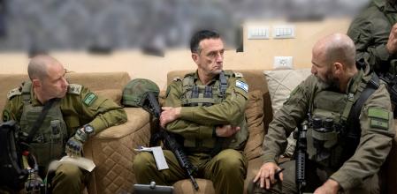This handout picture released by the Israeli army on December 23, 2023 reportedly shows the Israeli army's Chief of the General Staff Herzi Halevi (C) during a situational assessment with Israeli army soldiers in Khan Yunis with the Head of the Southern Command Major General Yaron Finkelman (L) and the CO of the 98th Brigade Brigadier General Dan Goldfus (R); amid the ongoing conflict between Israel and the Palestinian militant group Hamas in the Gaza Strip. (Photo by Israeli Army / AFP) / === RESTRICTED TO EDITORIAL USE - MANDATORY CREDIT