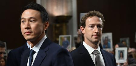 TOPSHOT - (L-R) Shou Zi Chew, CEO of TikTok and Mark Zuckerberg, CEO of Meta, arrive to testify before the US Senate Judiciary Committee hearing, 