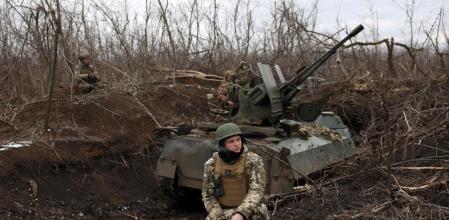 TOPSHOT - Ukrainian anti-aircraft gunners of the 93rd Separate Mechanized Brigade Kholodny Yar monitor the sky from their positions in the direction of Bakhmut in the Donetsk region, amid the Russian invasion of Ukraine, on February 20, 2024. (Photo by Anatolii STEPANOV / AFP)