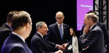Christian Lindner, Germany's finance minister, right, speaks with Mario Draghi, Italy's former prime minister, at an informal meeting of European Union (EU) economic and financial affairs ministers in Ghent, Belgium, on Saturday, Feb. 24, 2024. European Union finance chiefs are trying to figure out how to fund increased spending needs for defense as the war in Ukraine is about to enter its third year. Photographer: Simon Wohlfahrt/Bloomberg