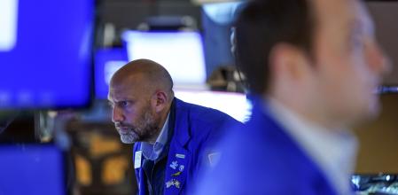 Traders work on the floor at the New York Stock Exchange in New York, Wednesday, June 15, 2022. U.S. stocks are rallying Wednesday and are on track for their first gain in six days. But more turbulence may be ahead when the Federal Reserve announces in the afternoon how sharply it's raising interest rates. (AP Photo/Seth Wenig)
