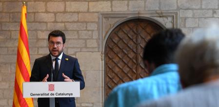 (FILES) The Catalan regional president, Pere Aragones holds a press conference following his meeting with the Spanish prime minister, at the Generalitat palace (Catalan regional government headquarters) in Barcelona on September 15, 2021. Catalonia's President Pere Aragones said on March 13, 2024 that he had dissolved the Spanish region's parliament and called early elections for May 12 after his budget project was rejected by the assembly. (Photo by LLUIS GENE / POOL / AFP)
