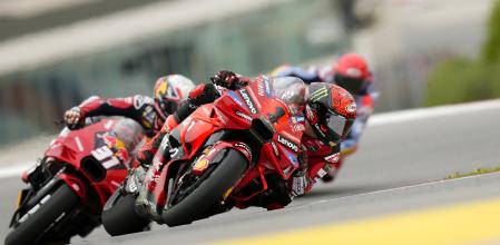 MotoGP rider Francesco Bagnaia of Italy takes a curve during the Portuguese Motorcycle Grand Prix at the Algarve International circuit near Portimao, Portugal, Sunday, March 24, 2024. (AP Photo/Jose Breton)