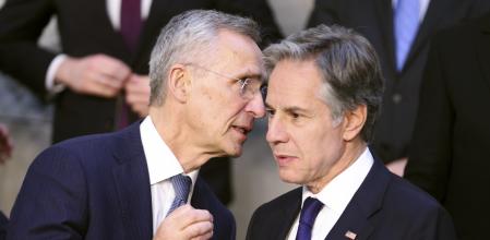 NATO Secretary General Jens Stoltenberg, left, speaks with United States Secretary of State Antony Blinken during a group photo of NATO foreign ministers at NATO headquarters in Brussels, Wednesday, April 3, 2024. NATO foreign ministers gathered in Brussels on Wednesday to debate plans to provide more predictable, longer-term support to Ukraine. (Johanna Geron, Pool)