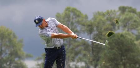Golf - The Masters - Augusta National Golf Club, Augusta, Georgia, U.S. - April 11, 2024 Bryson DeChambeau of the U.S. hits his tee shot on the 4th hole during the first round REUTERS/Brian Snyder