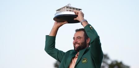 Scottie Scheffler holds the trophy after winning the Masters golf tournament at Augusta National Golf Club Sunday, April 14, 2024, in Augusta, Ga. (AP Photo/Matt Slocum)