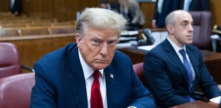 Former US President Donald Trump attends the first day of his trial for allegedly covering up hush money payments linked to extramarital affairs, at Manhattan Criminal Court in New York City on April 15, 2024. Donald Trump is in court Monday as the first US ex-president ever to be criminally prosecuted, a seismic moment for the United States as the presumptive Republican nominee campaigns to re-take the White House. The scandal-plagued 77-year-old is accused of falsifying business records in a scheme to cover up an alleged sexual encounter with adult film actress Stormy Daniels to shield his 2016 election campaign from adverse publicity. (Photo by JEENAH MOON / POOL / AFP)