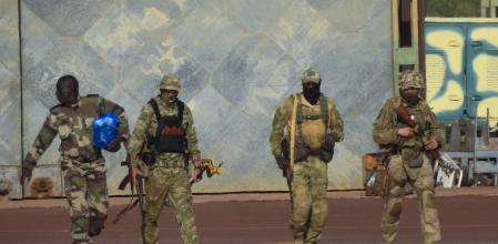 FILE - This undated file photograph issued by French military shows three Russian mercenaries, right, in northern Mali. Russia has engaged in under-the-radar military operations in at least half a dozen countries in Africa in the last five years using a shadowy mercenary force analysts say is loyal to President Vladimir Putin. Russia’s invasion of Ukraine is certain to dominate an upcoming NATO summit in Madrid. But host nation Spain and other members are quietly pushing the Western alliance to consider how mercenaries aligned with Russian President Vladimir Putin are spreading Moscow’s influence in Africa. (French Army via AP, File)