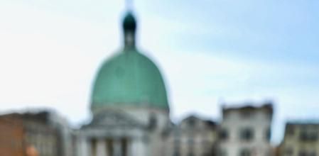 A person shows a calendar of the paying days to visit Venice, on April 19, 2024 in front of Santa Lucia train station in Venice. The new strategy to lower the number of tourists visiting the UNESCO World Heritage site calls for day-trippers to pay a five-euro ticket to enter the historic city centre and is due to start on April 25. The 