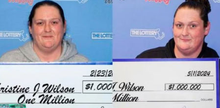 Christine Wilson con los cheques de los dos premios ganados