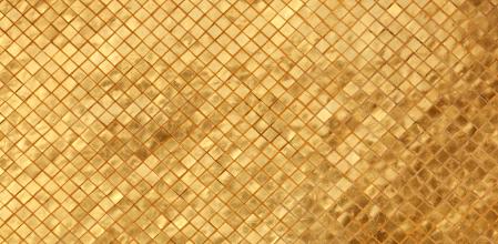 Gold tile mosaic background at an ancient Thai Buddhist temple, Bangkok, Thailand.
