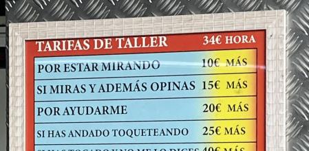 El cartel de un taller mecánico que se ha hecho viral por las tarifas que cobra: 