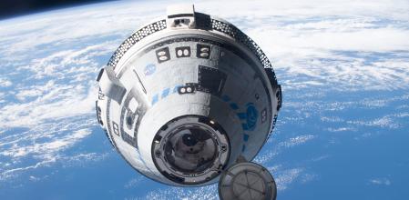 La Starliner, fotografiada desde la Estación Espacial Internacional en su segundo vuelo de prueba no tripulado en mayo del 2022