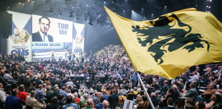 Supporters take part in a campaign meeting of Flemish far-right party of Vlaams Belang at the Antwerp Expo in Antwerp on June 2, 2024, ahead of the June 9 Belgian federal election. (Photo by Simon Wohlfahrt / AFP)