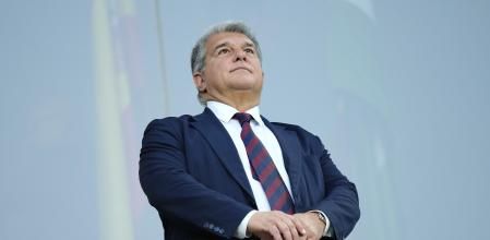 FILE - Joan Laporta, Barcelona FC President, takes his place in the stands for the Spanish La Liga soccer match between Cadiz and Barcelona in Cadiz, Spain, on April 13, 2024. A Spanish court has reduced the scope of its probe into the Barcelona’s payment of millions of dollars over several years to a former vice president of Spain’s refereeing committee. A Barcelona-based court said Friday, May 31, 2024, that it will no longer investigate club president Joan Laporta for his first stint in charge of the club from 2003-2010 since any possible crimes have prescribed under the statute of limitations. (AP Photo/Jose Breton)