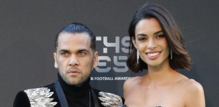 Brazilian soccer player Dani Alves and his wife Joana Sanz arrive for the ceremony of the Best FIFA Football Awards in the Royal Festival Hall in London, Britain, Monday, Sept. 24, 2018. (AP Photo/Frank Augstein)