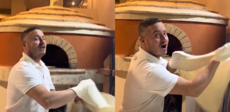 El cocinero lanzó la masa por los aires.