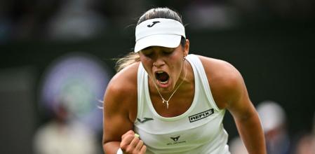 Spain's Jessica Bouzas Maneiro celebrates winning a point against Czech Republic's Marketa Vondrousova during their women's singles tennis match on the second day of the 2024 Wimbledon Championships at The All England Lawn Tennis and Croquet Club in Wimbledon, southwest London, on July 2, 2024. (Photo by ANDREJ ISAKOVIC / AFP) / RESTRICTED TO EDITORIAL USE