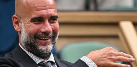 Manchester City's Spanish coach Pep Guardiola reacts in Royal box on Centre Court during the sixth day of the 2024 Wimbledon Championships at The All England Lawn Tennis and Croquet Club in Wimbledon, southwest London, on July 6, 2024. (Photo by ANDREJ ISAKOVIC / AFP) / RESTRICTED TO EDITORIAL USE
